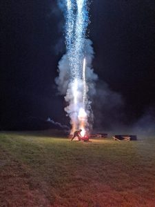 Hand fire traditional display with flare by IPC crew member